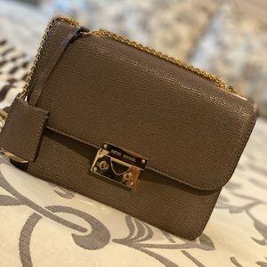 Greige Henri Bendel Crossbody. Comes with dust bag